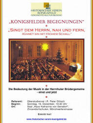 Das Bild zeigt ein Poster für eine Veranstaltung des Historischen Vereins Königsfeld mit dem Titel "Königsfelder Begegnungen", das ein Bild eines Konzerts in einer festlich geschmückten, großen Halle und Informationen über Datum, Uhrzeit und Ort enthält.