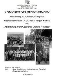 Ein Plakat kündigt eine Veranstaltung des Historischen Vereins Königsfeld an, mit dem Titel "Königsfeld in der Zeit des Dritten Reiches", die am 17. Oktober 2010 um 19:30 Uhr stattfindet, illustriert mit mehreren historischen Schwarz-Weiß-Fotografien von Gruppen und Szenen.